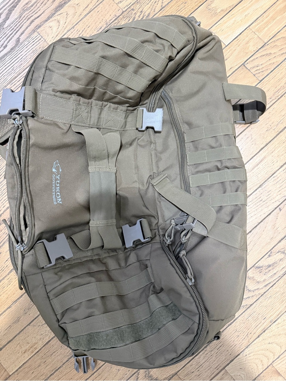 Tactical Olive Green Sling Backpack with MOLLE Webbing
